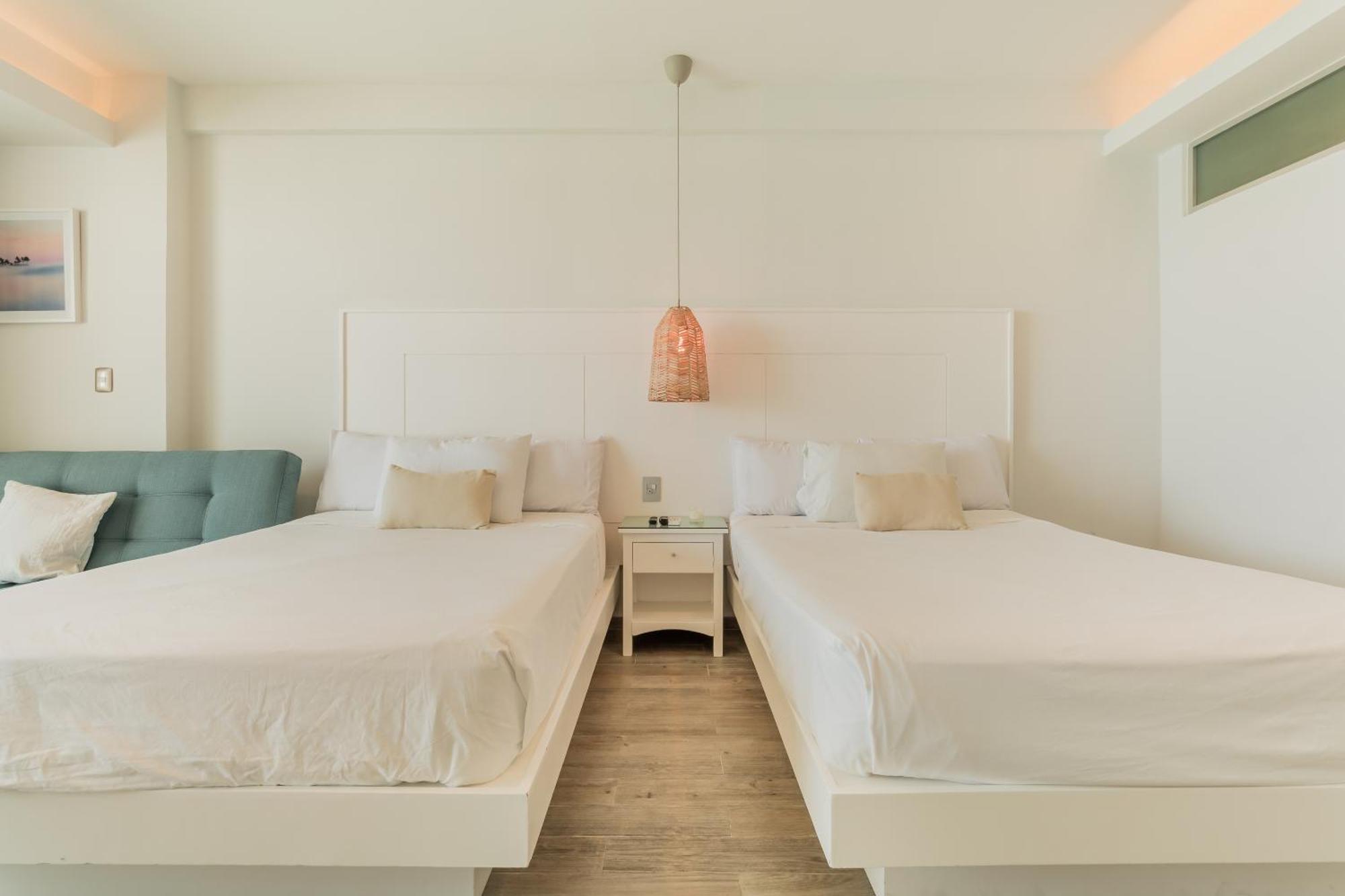 The Ocean Vibes Suites By Casa Paraiso Cancún Zewnętrze zdjęcie